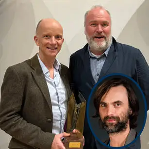 Robin Dunlop and Tom Hostler accepting award on behalf of Dr Simon Gill