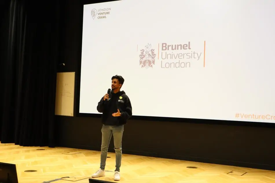 Christopher D'Souza pitching before being crowned London Venture Crawl 2024 Pitch-off Winner