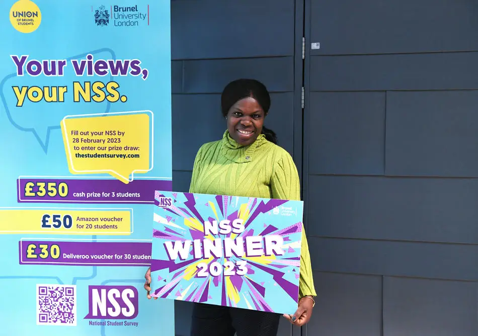 Betty Bopete collecting her £30 Deliveroo voucher 