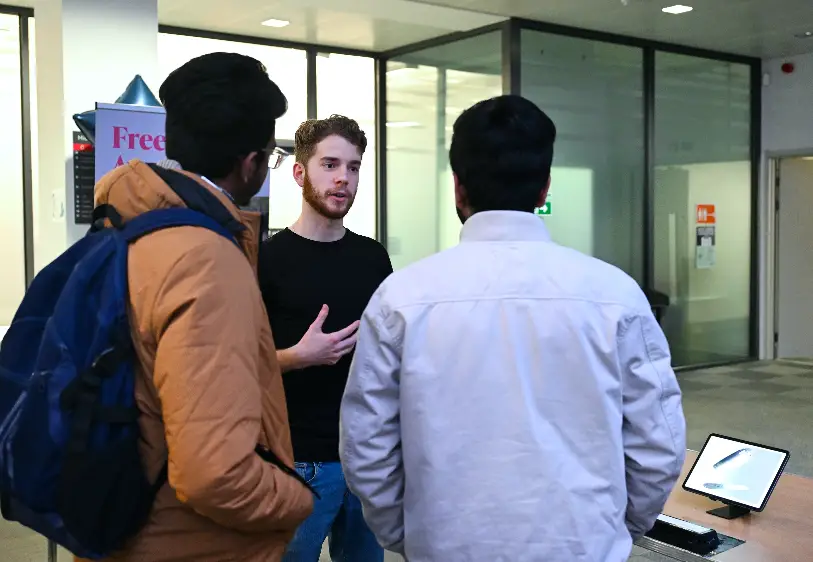 Brunel graduate Louis Decleyn, founder of Sine speaking with attendees 