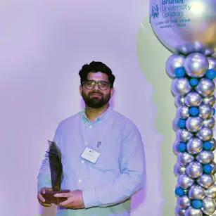 Dr Sahil Datta holding his trophy